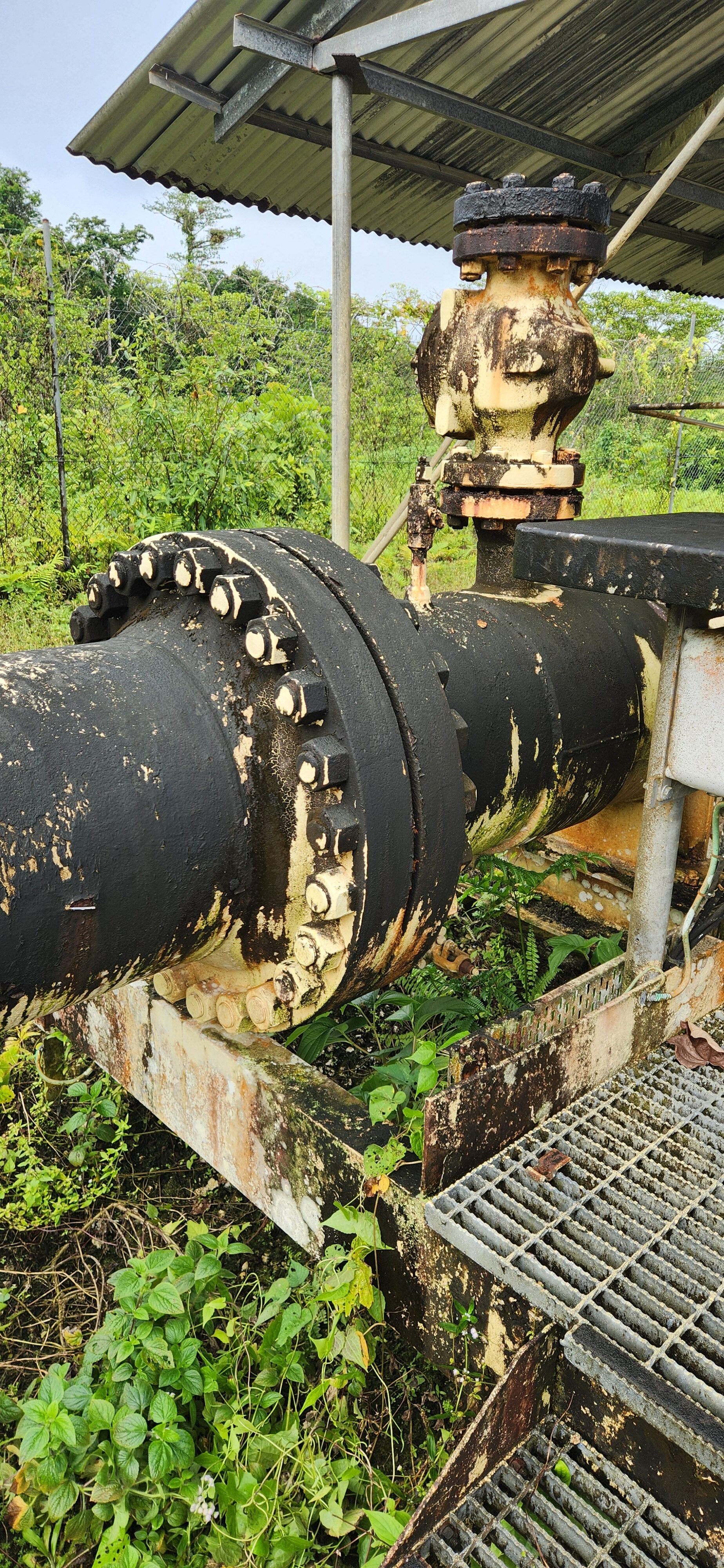 Kopi gas pipeline site in Papua New Guinea showing live flange maintenance access conditions
