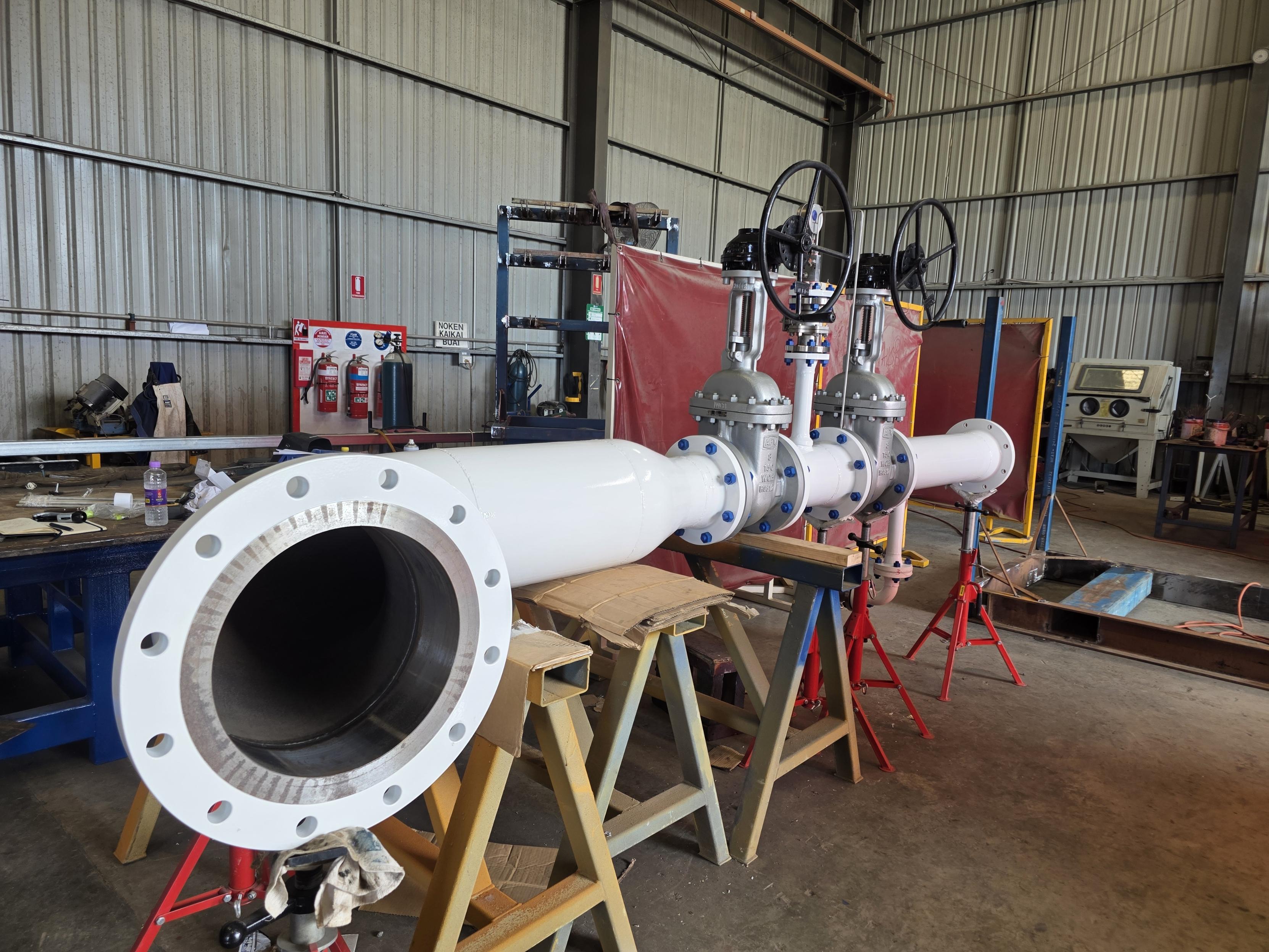 Completed white pipe spool assembly with valves and flanges fabricated by MTIS in Port Moresby Papua New Guinea