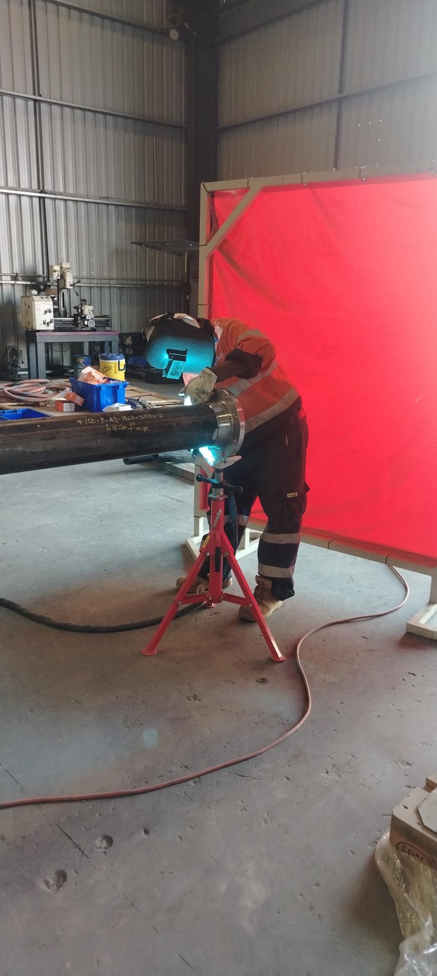 Pipe spool welding and fabrication underway in the MTIS workshop for a turnkey spool package in PNG